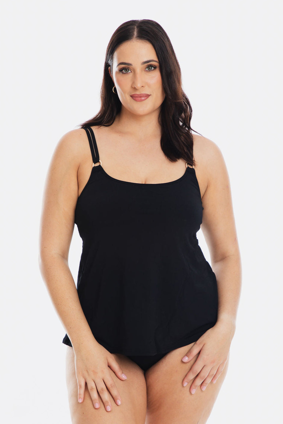 Woman wearing a black tankini set on a white background